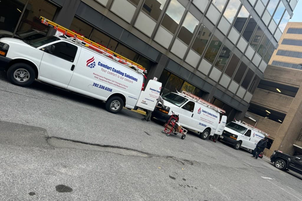 HVAC technicians working on commercial equipment